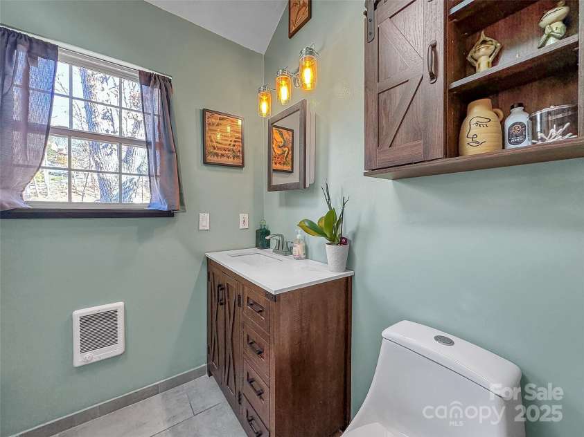 66 Hoosier Court, Lake Junaluska, NC 28745.  MLS# CAR4200761, YatesRealty ID 12928. Garage Apartment Full Bath