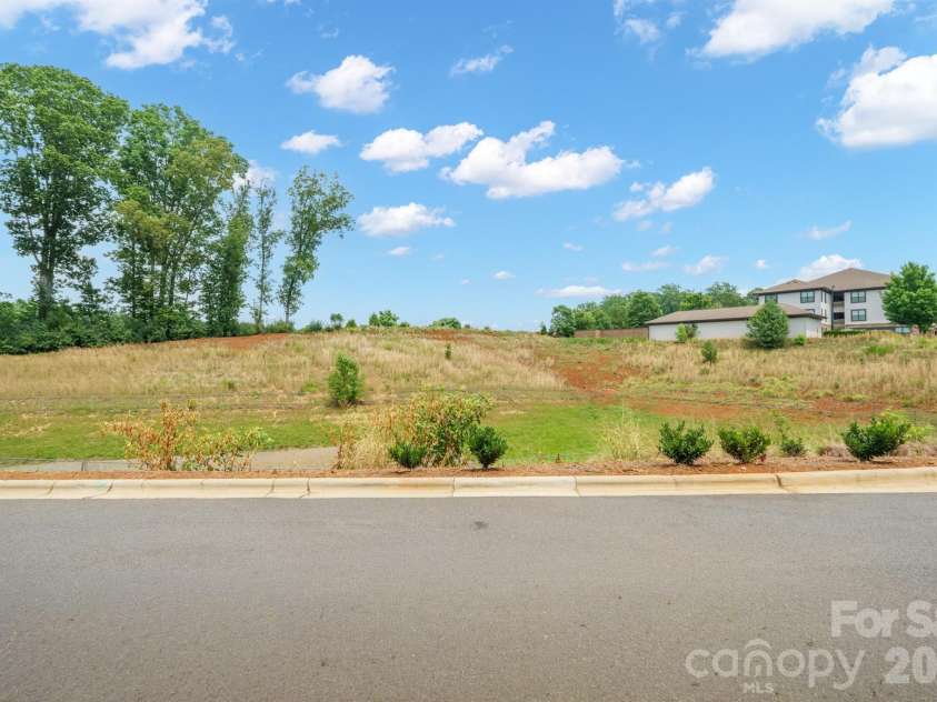 5939 Ardrey Kell Road, Charlotte, NC 28277.  MLS# CAR4352404, YatesRealty ID 12929. Back view (this townhome does not back up to other townhomes or structures, providing  peace and privacy)