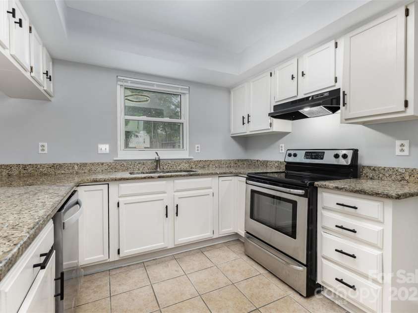 2112 Flint Glenn Lane, Charlotte, NC 28262.  MLS# CAR4257768, YatesRealty ID 12934. 
