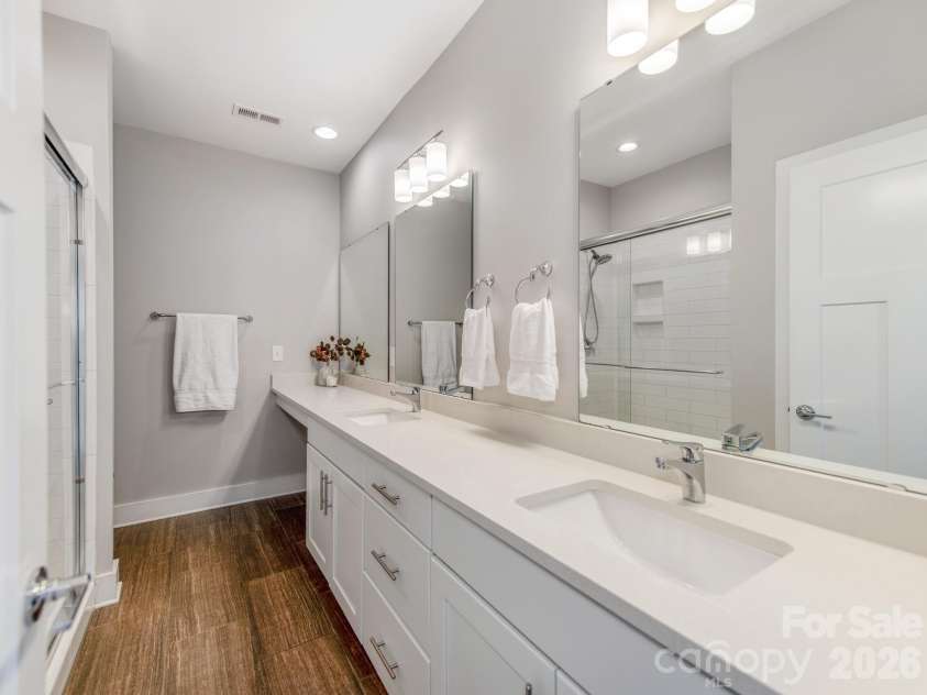 436 Southend Crossing Lane, Charlotte, NC 28203.  MLS# CAR4357576, YatesRealty ID 12934. Primary bathroom with extended counterspace.