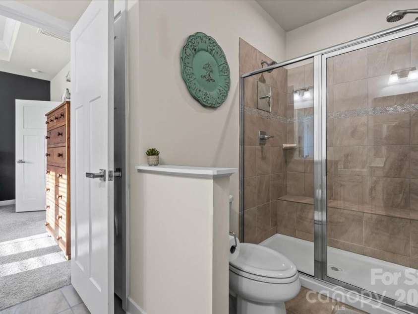 606 Crudent Road, Tega Cay, SC 29708.  MLS# CAR4360314, YatesRealty ID 12935. Owner's Bathroom