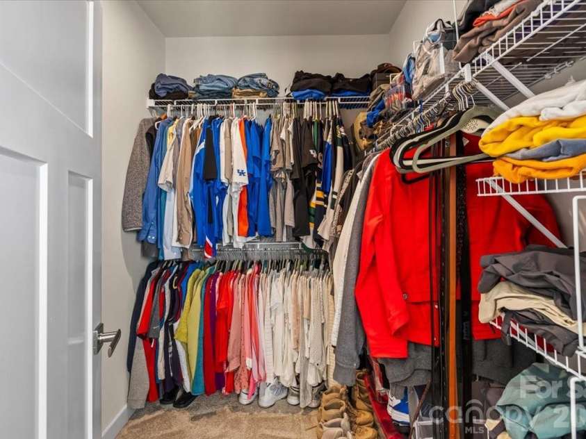 606 Crudent Road, Tega Cay, SC 29708.  MLS# CAR4360314, YatesRealty ID 12935. Owner's Suite Walk-In Closet