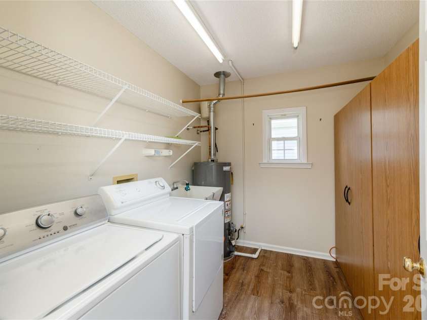176 Derbyshire Drive, Hendersonville, NC 28792.  MLS# CAR4362871, YatesRealty ID 12938. Dedicated Laundry Room