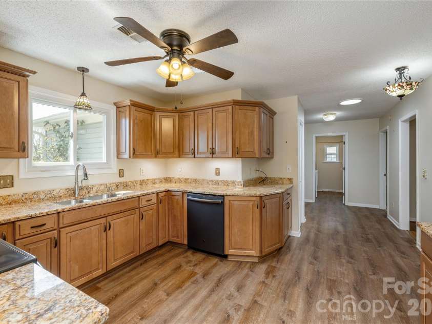 176 Derbyshire Drive, Hendersonville, NC 28792.  MLS# CAR4362871, YatesRealty ID 12938. Updated kitchen with granite counters