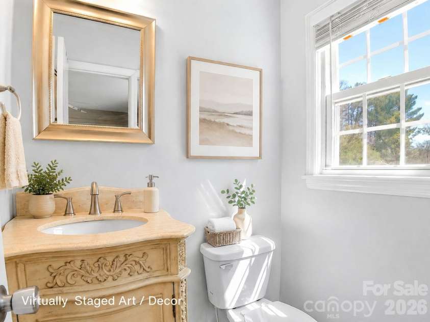 1091 16th Avenue, Hickory, NC 28601.  MLS# CAR4363676, YatesRealty ID 12939. Convenient private half bath connected to primary suite