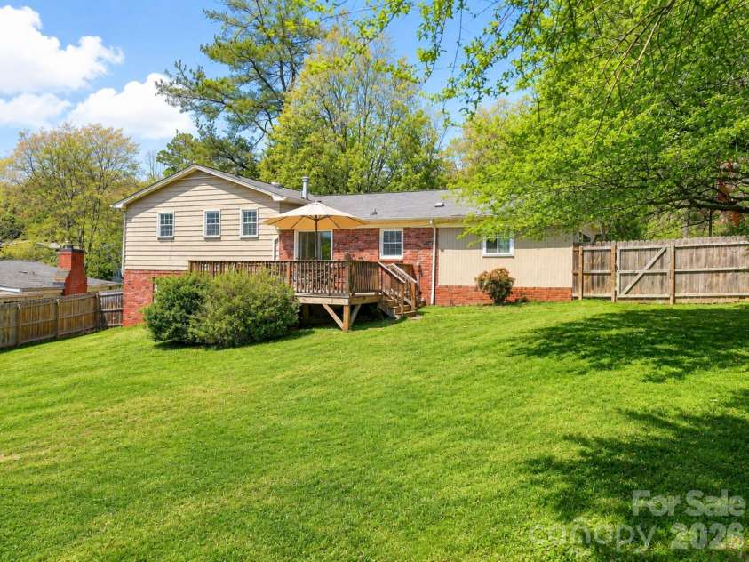1091 16th Avenue, Hickory, NC 28601.  MLS# CAR4363676, YatesRealty ID 12939. Private fenced backyard with mature trees and room to enjoy outdoors