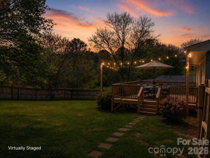 1091 16th Avenue, Hickory, NC 28601.  MLS# CAR4363676, YatesRealty ID 12939. Relaxing outdoor living space with evening ambiance - just add string lights as virtually staged