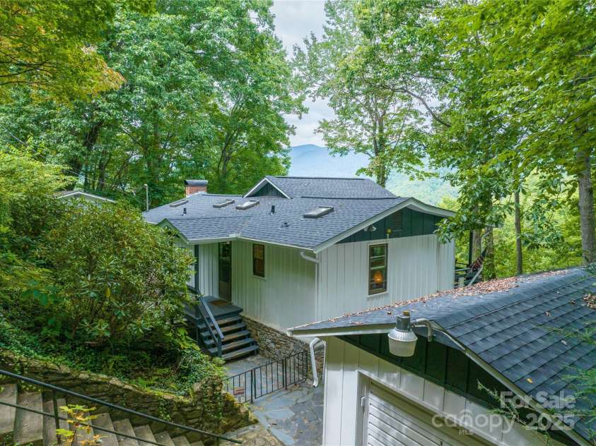 330 Overlook Drive, Maggie Valley, NC 28751.  MLS# CAR4300696, YatesRealty ID 1294. From top of property, stairs lead to and from the parking area