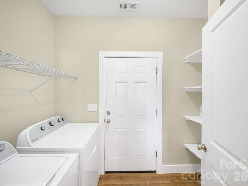 457 Riverwind Drive, Hendersonville, NC 28739.  MLS# CAR4364359, YatesRealty ID 12941. Dedicated Laundry/Mud Room