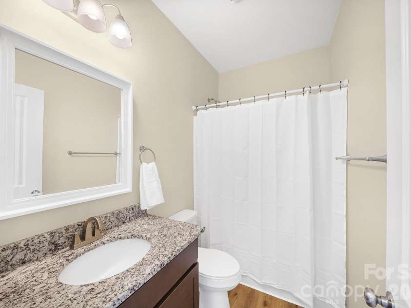 457 Riverwind Drive, Hendersonville, NC 28739.  MLS# CAR4364359, YatesRealty ID 12941. Guest Bath