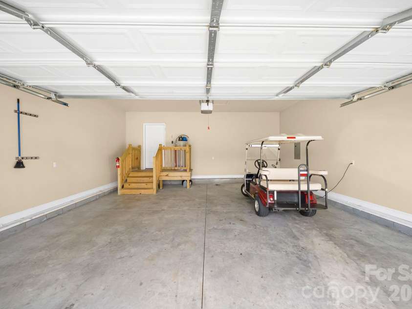 457 Riverwind Drive, Hendersonville, NC 28739.  MLS# CAR4364359, YatesRealty ID 12941. Spacious Garage