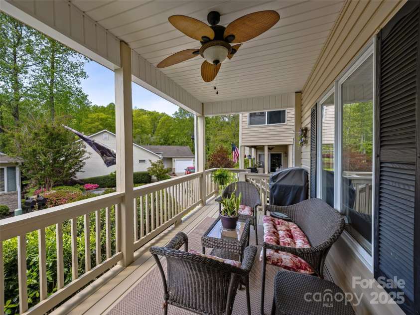 27 Putter Court, Hendersonville, NC 28739.  MLS# CAR4253747, YatesRealty ID 12942. Lower Covered Porch