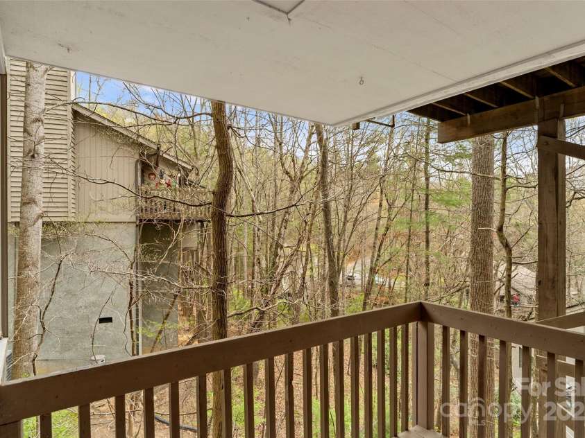 31 Cedarwood Lane, Asheville, NC 28803.  MLS# CAR4126621, YatesRealty ID 12943. Deck off of 2nd owners suite