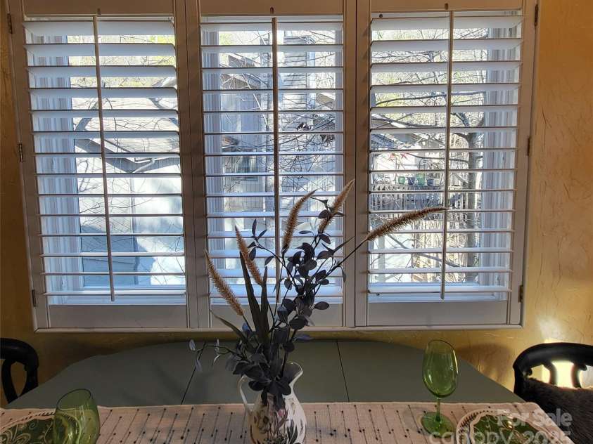 31 Cedarwood Lane, Asheville, NC 28803.  MLS# CAR4126621, YatesRealty ID 12943. Newer, energy efficient windows with quality shutters