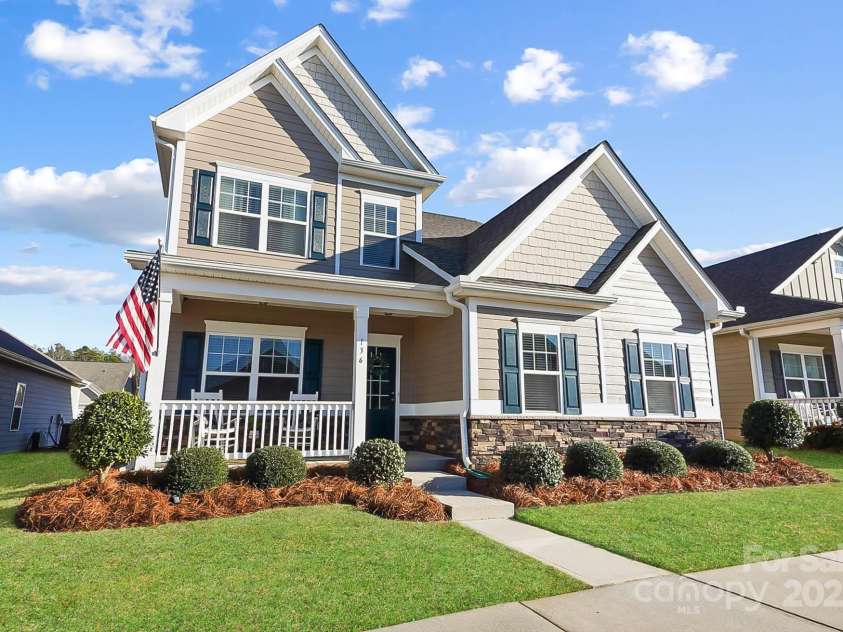 136 Kingston Drive, Locust, NC 28097.  MLS# CAR4227262, YatesRealty ID 12944. Beautiful two story home, exterior freshly repainted, virtually edited grass.