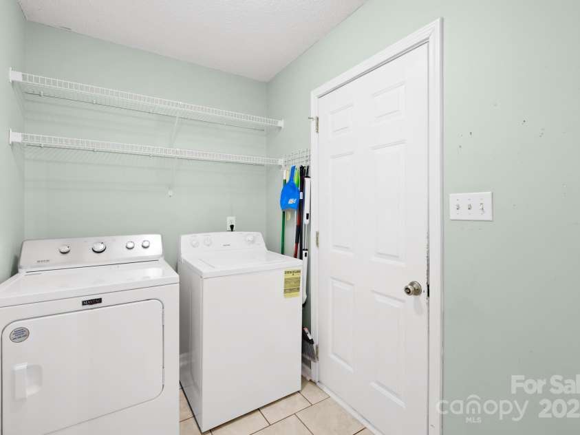 3006 Emerald Meadow Lane, Charlotte, NC 28273.  MLS# CAR4255235, YatesRealty ID 12948. Laundry Room Washer and Dryer do not convey
