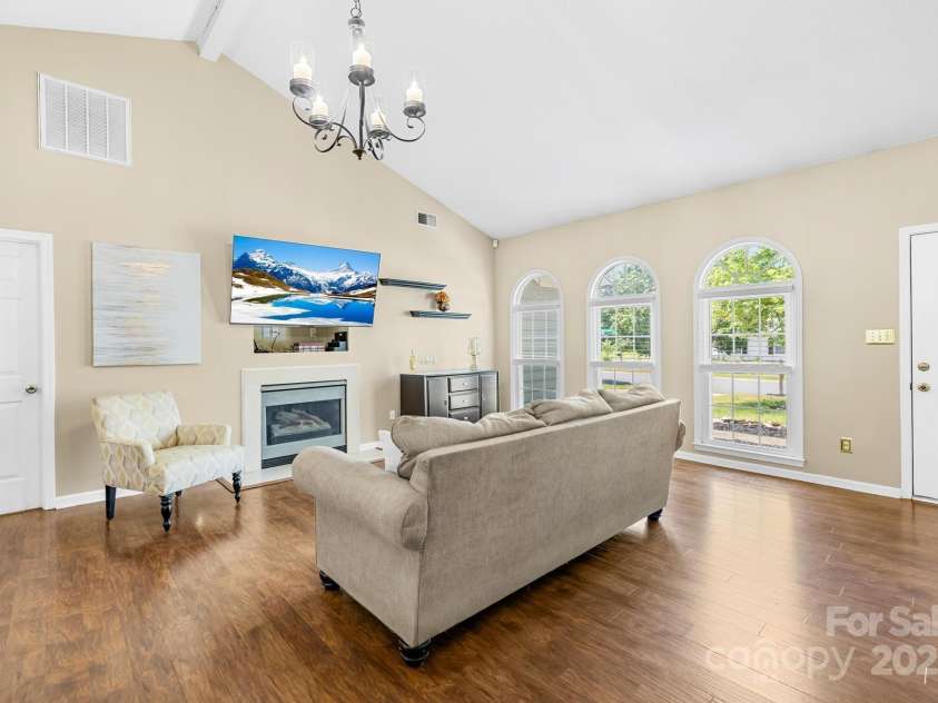 3006 Emerald Meadow Lane, Charlotte, NC 28273.  MLS# CAR4255235, YatesRealty ID 12948. Living Room- Fireplace AS IS