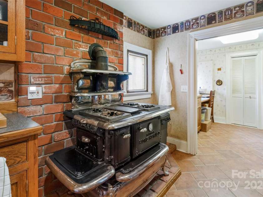 759 and 755 Snelson Road, Marshall, NC 28753.  MLS# CAR4186627, YatesRealty ID 1295. Kitchen main house