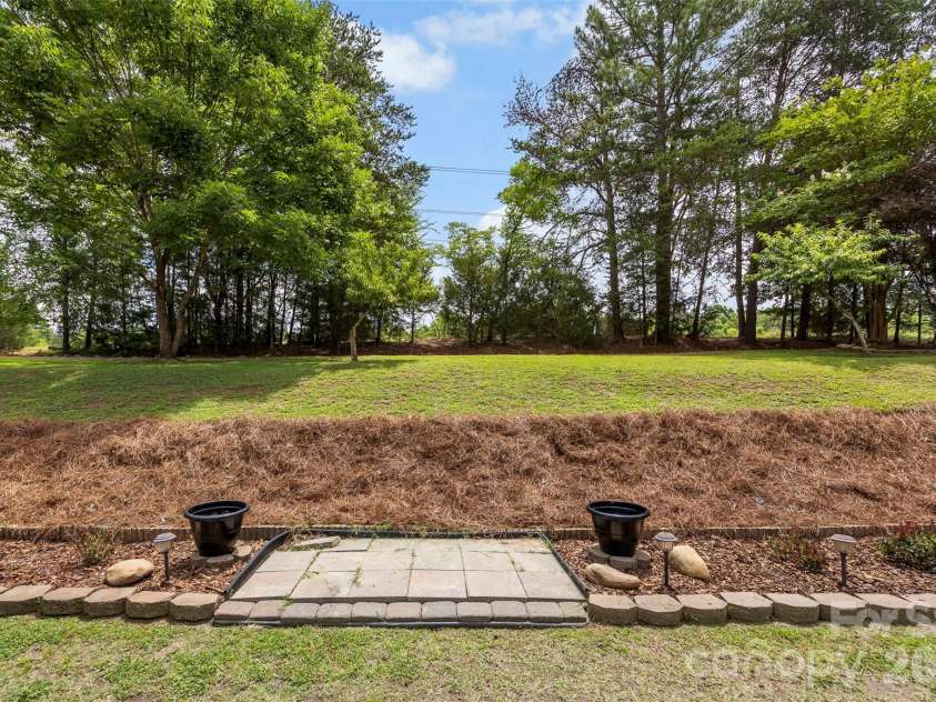 770 Cooks Cove Ridge, Clover, SC 29710.  MLS# CAR4380714, YatesRealty ID 1295. Large backyard