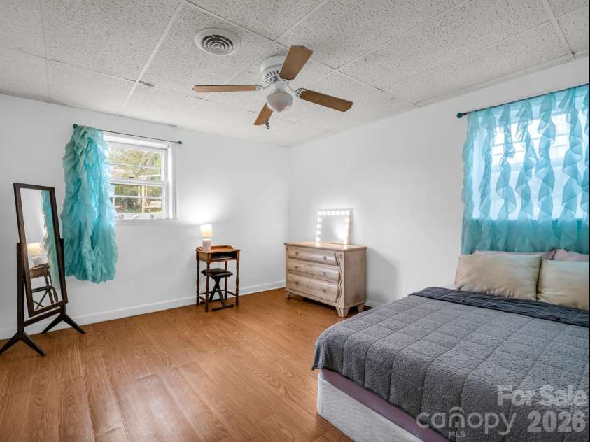 54 Broadway Avenue, Tryon, NC 28782.  MLS# CAR4357107, YatesRealty ID 12954. 2nd Bedroom in Basement