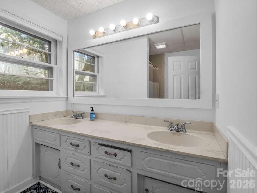 54 Broadway Avenue, Tryon, NC 28782.  MLS# CAR4357107, YatesRealty ID 12954. Basement has Full Bath