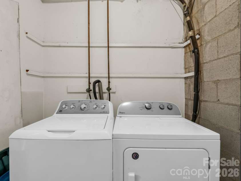 54 Broadway Avenue, Tryon, NC 28782.  MLS# CAR4357107, YatesRealty ID 12954. Laundry Room in Basement