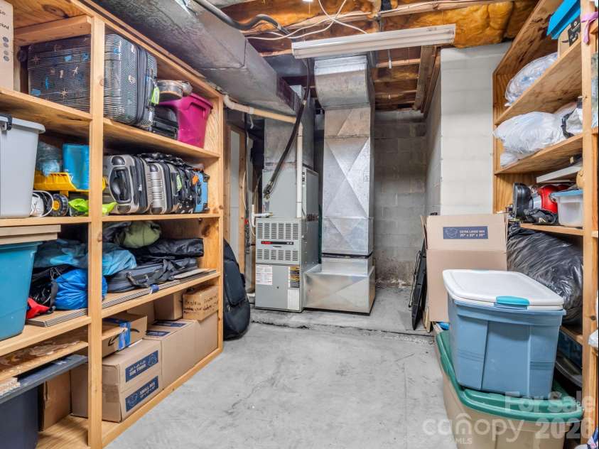 54 Broadway Avenue, Tryon, NC 28782.  MLS# CAR4357107, YatesRealty ID 12954. Storage Room in Basement