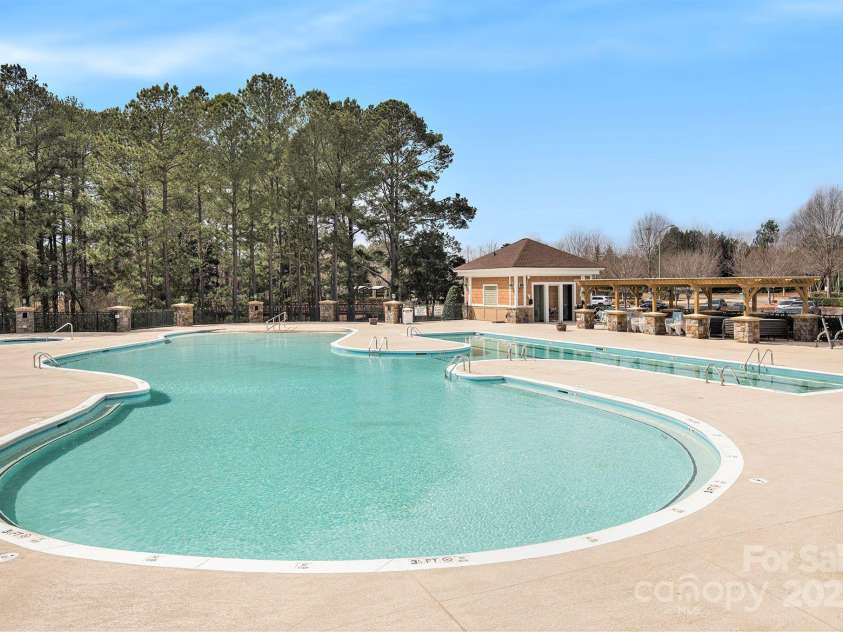 43041 Mimosa Court, Fort Mill, SC 29707.  MLS# CAR4309711, YatesRealty ID 12955. Large Outdoor Pool, 1 of 2 pools