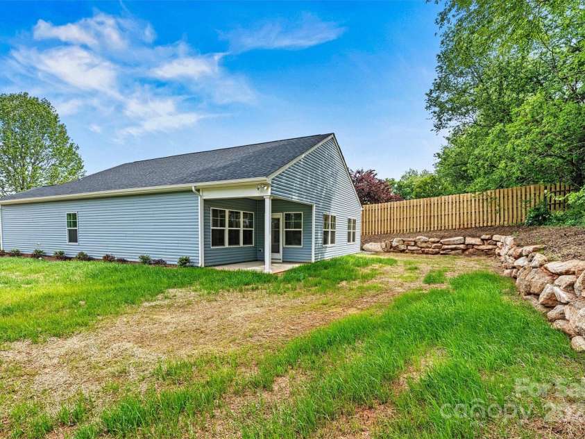 3567 Farmfield Drive, Claremont, NC 28610.  MLS# CAR4250257, YatesRealty ID 12960. Covered patio from a distance