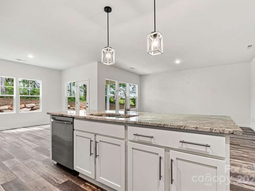 3567 Farmfield Drive, Claremont, NC 28610.  MLS# CAR4250257, YatesRealty ID 12960. Kitchen to living