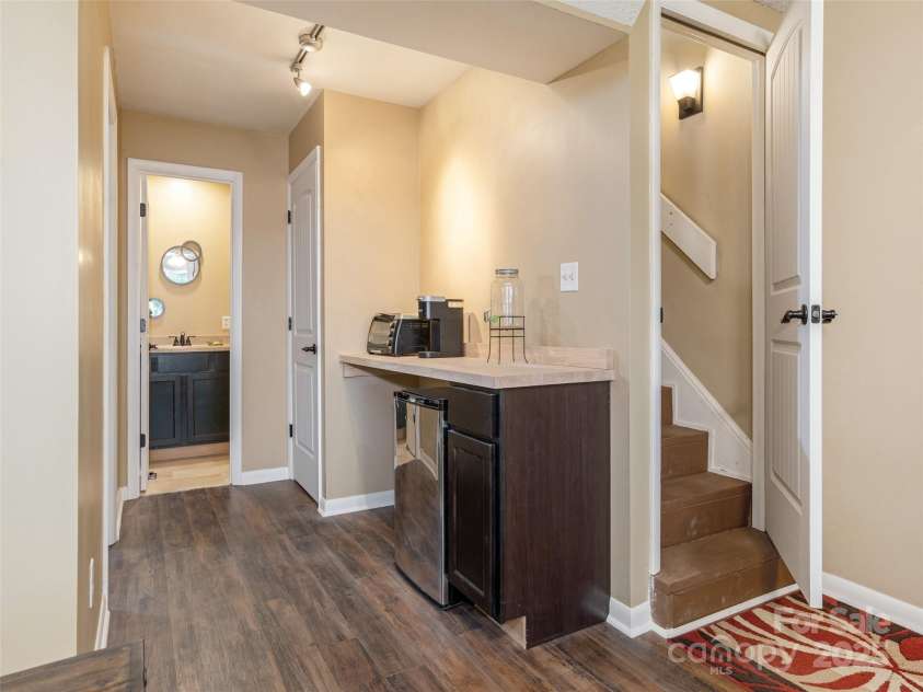 23 Hollybrook Drive, Asheville, NC 28803.  MLS# CAR4253412, YatesRealty ID 12962. Dry bar with mini-fridge
