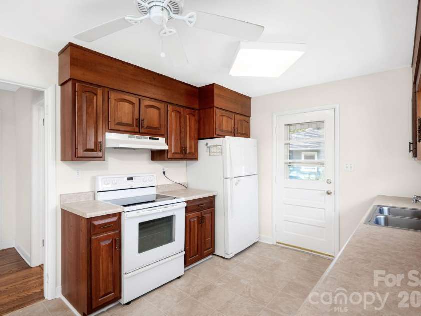 8 Pershing Road, Asheville, NC 28805.  MLS# CAR4364991, YatesRealty ID 12964. Galley Style Kitchen