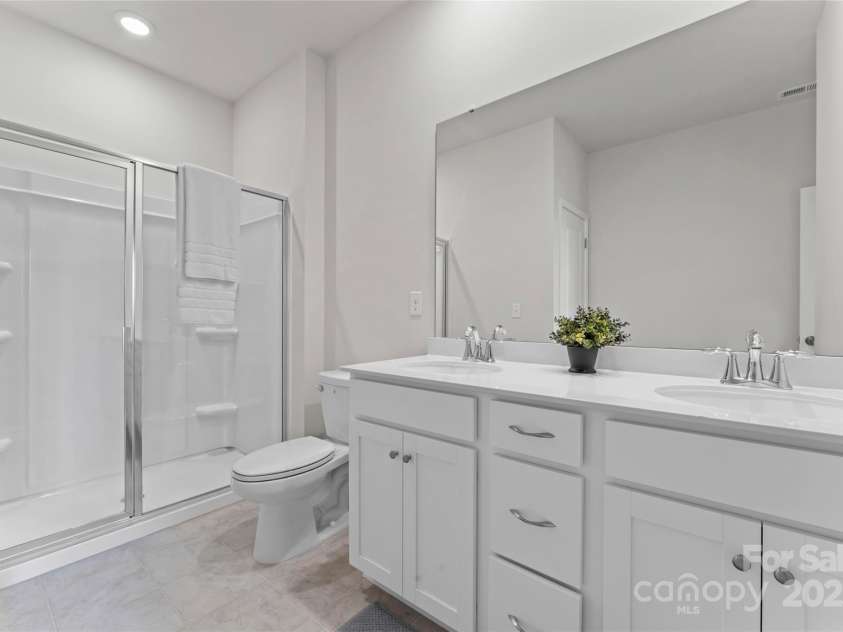 127 Doncaster Drive, Mooresville, NC 28115.  MLS# CAR4216362, YatesRealty ID 12968. Main level guest suite private full bathroom