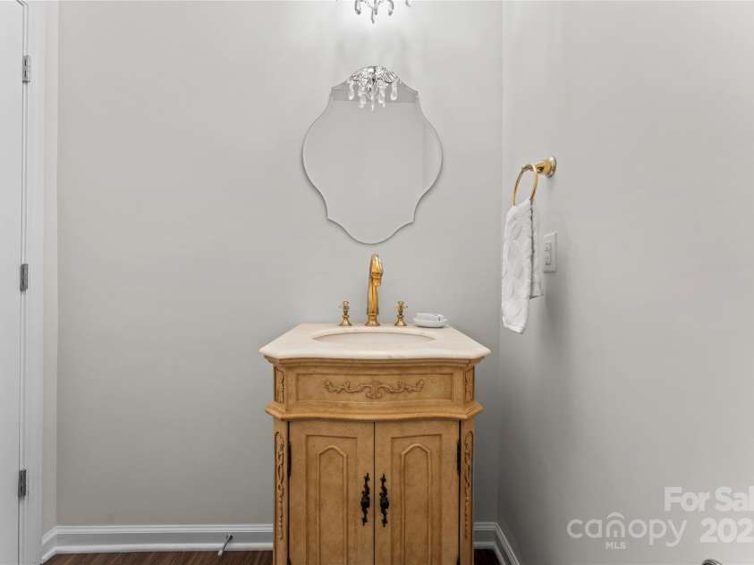 127 Doncaster Drive, Mooresville, NC 28115.  MLS# CAR4216362, YatesRealty ID 12968. Main level half bathroom