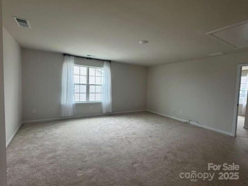 127 Doncaster Drive, Mooresville, NC 28115.  MLS# CAR4216362, YatesRealty ID 12968. Massive loft on upper level