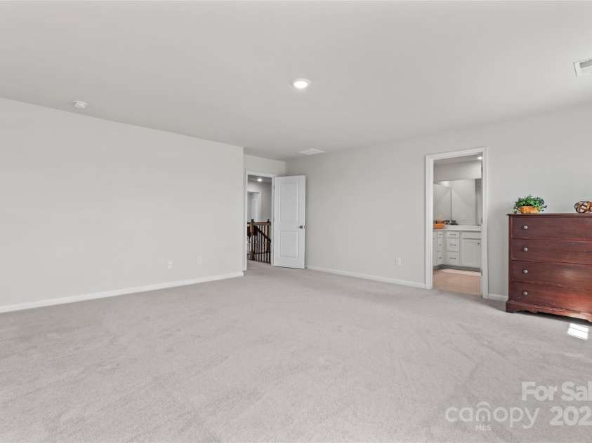 127 Doncaster Drive, Mooresville, NC 28115.  MLS# CAR4216362, YatesRealty ID 12968. Primary bedroom