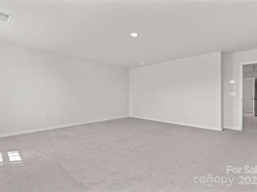 127 Doncaster Drive, Mooresville, NC 28115.  MLS# CAR4216362, YatesRealty ID 12968. Primary suite on upper level