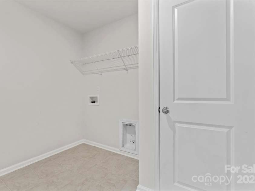 127 Doncaster Drive, Mooresville, NC 28115.  MLS# CAR4216362, YatesRealty ID 12968. Upper level laundry room