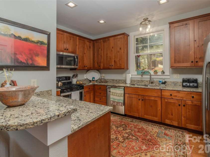 126 Mossycup Court, Tuckasegee, NC 28783.  MLS# CAR4324867, YatesRealty ID 12970. Gorgeous Kitchen