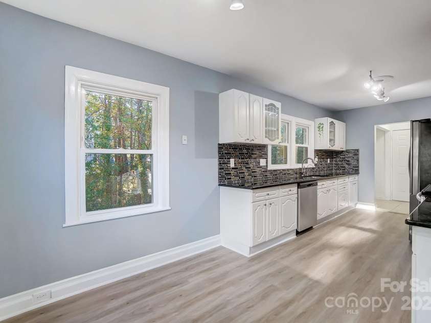 3703 Margaret Wallace Road, Matthews, NC 28105.  MLS# CAR4201589, YatesRealty ID 12974. 