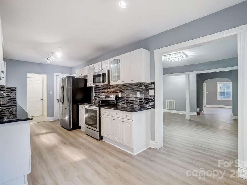 3703 Margaret Wallace Road, Matthews, NC 28105.  MLS# CAR4201589, YatesRealty ID 12974. 