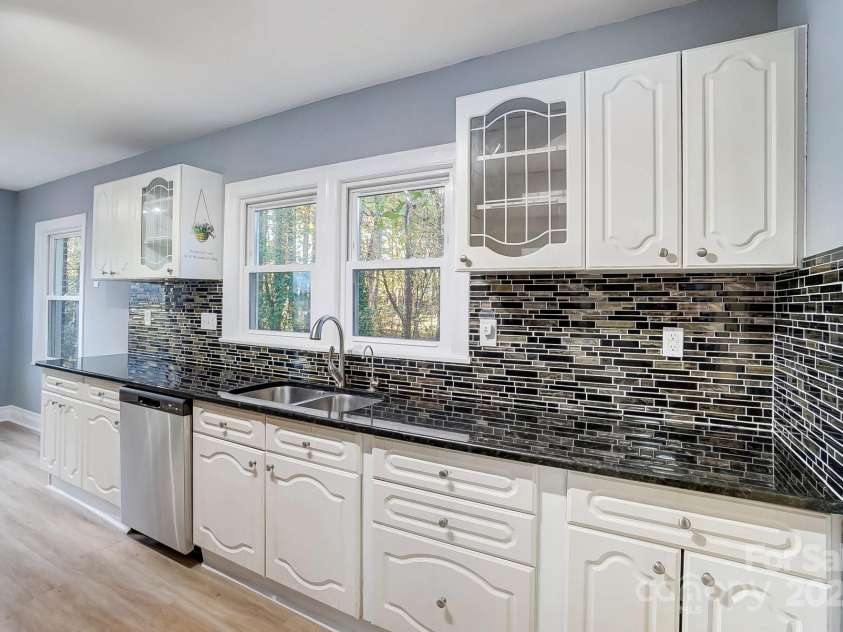 3703 Margaret Wallace Road, Matthews, NC 28105.  MLS# CAR4201589, YatesRealty ID 12974. 