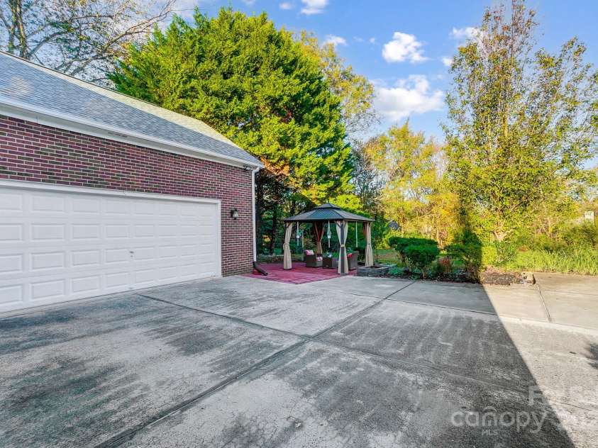 3703 Margaret Wallace Road, Matthews, NC 28105.  MLS# CAR4201589, YatesRealty ID 12974. 