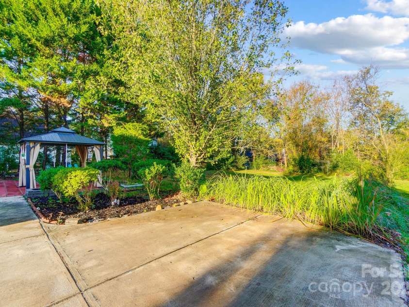 3703 Margaret Wallace Road, Matthews, NC 28105.  MLS# CAR4201589, YatesRealty ID 12974. 