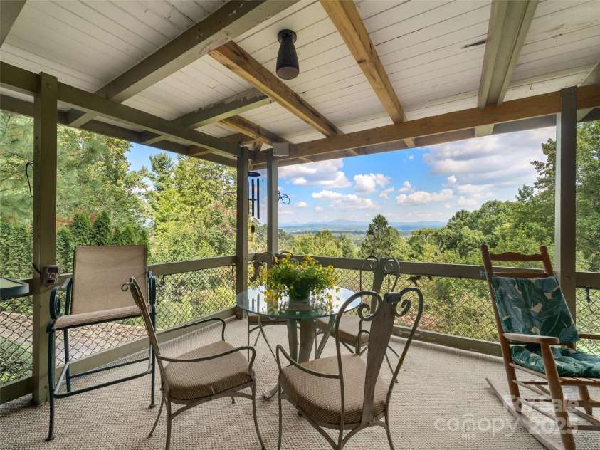 435 Upper Laurel Drive, Laurel Park, NC 28739.  MLS# CAR4305569, YatesRealty ID 12979. Front Porch