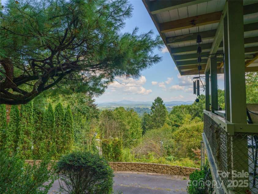 435 Upper Laurel Drive, Laurel Park, NC 28739.  MLS# CAR4305569, YatesRealty ID 12979. Side