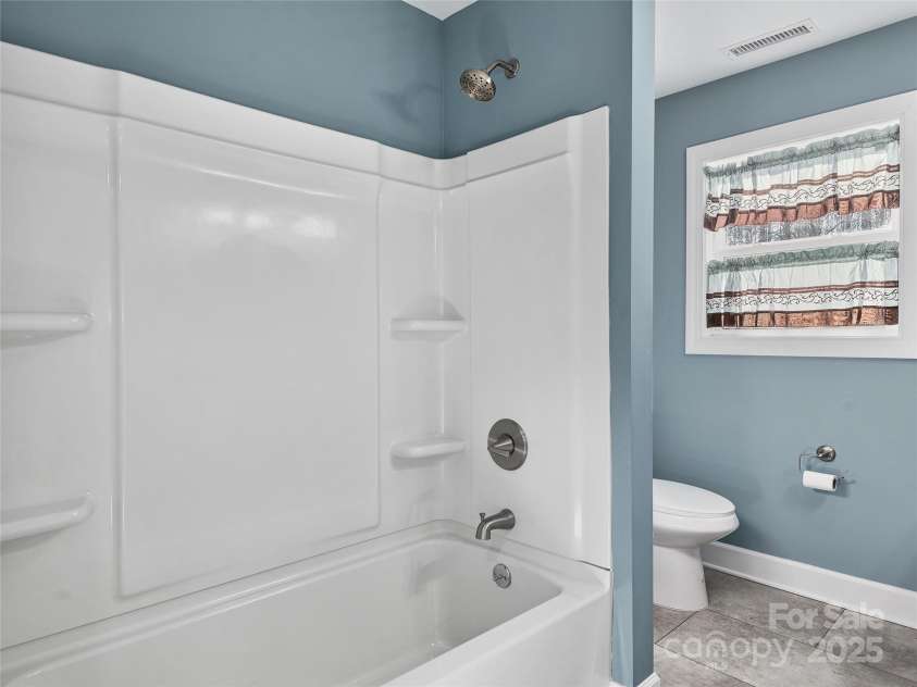 611 Peniel Road, Columbus, NC 28722.  MLS# CAR4327826, YatesRealty ID 12980. Guest bathroom