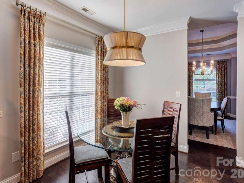 2663 Danbury Circle, Concord, NC 28027.  MLS# CAR4394399, YatesRealty ID 12988. Cozy breakfast nook with updated lighting.