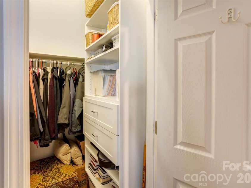 2663 Danbury Circle, Concord, NC 28027.  MLS# CAR4394399, YatesRealty ID 12988. Custom finished coat closet on the main level.