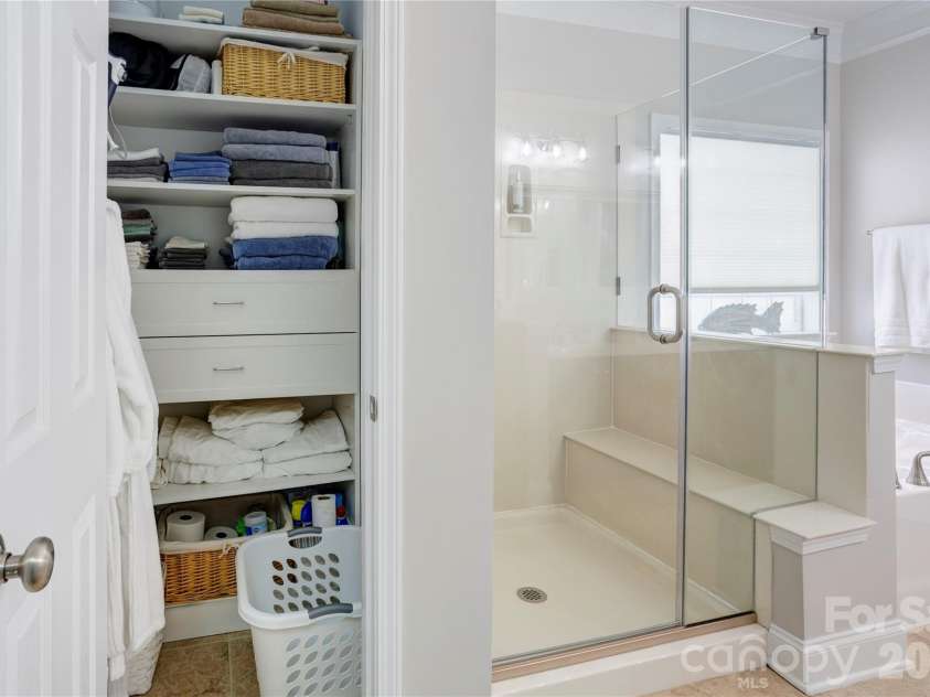 2663 Danbury Circle, Concord, NC 28027.  MLS# CAR4394399, YatesRealty ID 12988. Custom upfitted linen closet.